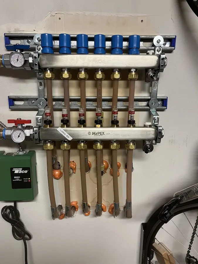 Plumber performing Sink Repair at a residential property in Woolwich